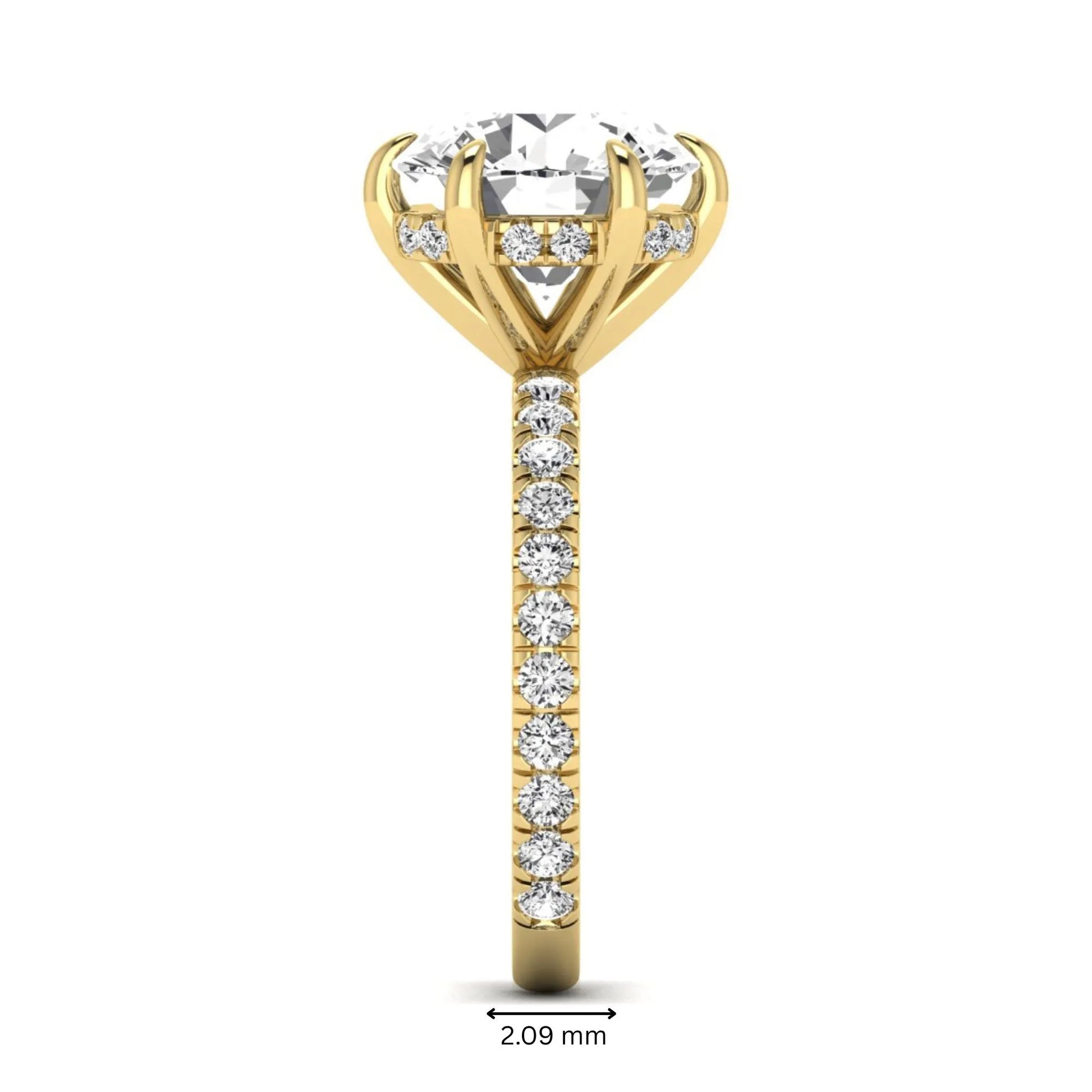 Round cut lab grown diamond solitaire engagement ring with pavé diamond band in yellow gold design.