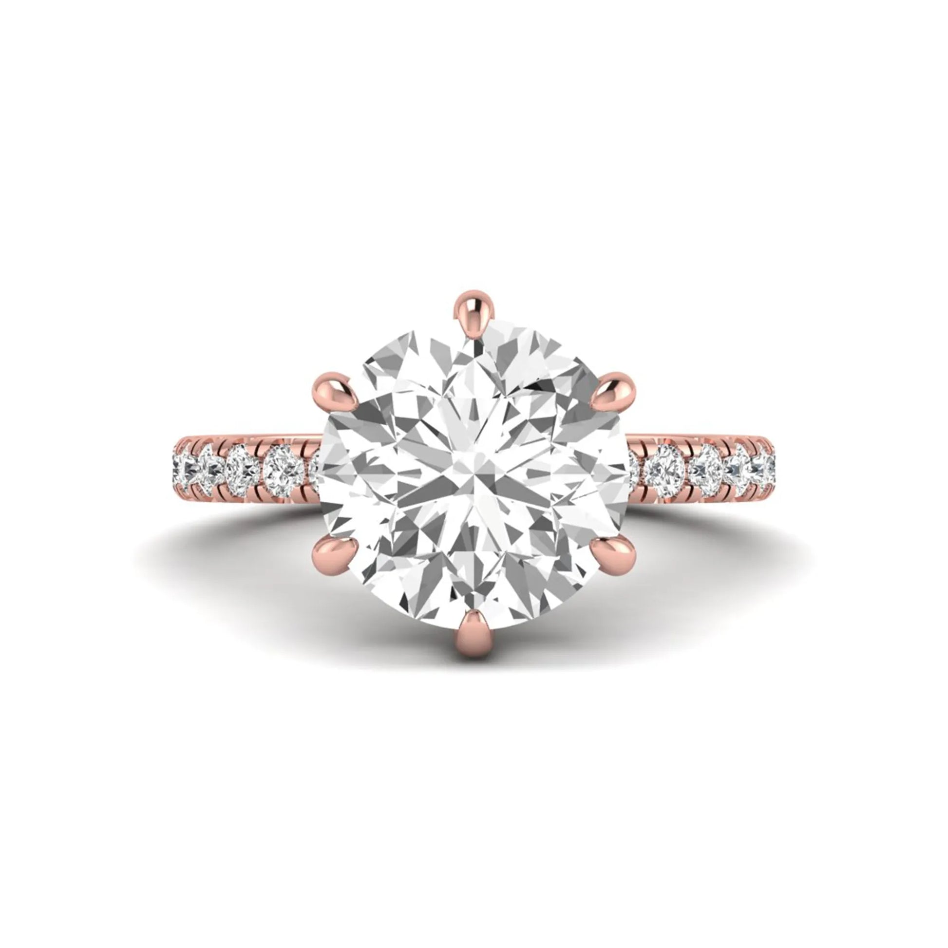 Round cut lab grown diamond solitaire engagement ring with pavé diamond band in rose gold design.