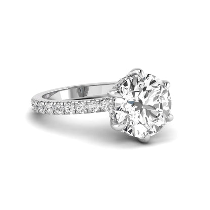 Round cut lab grown diamond solitaire engagement ring with pavé diamond band in white gold design.