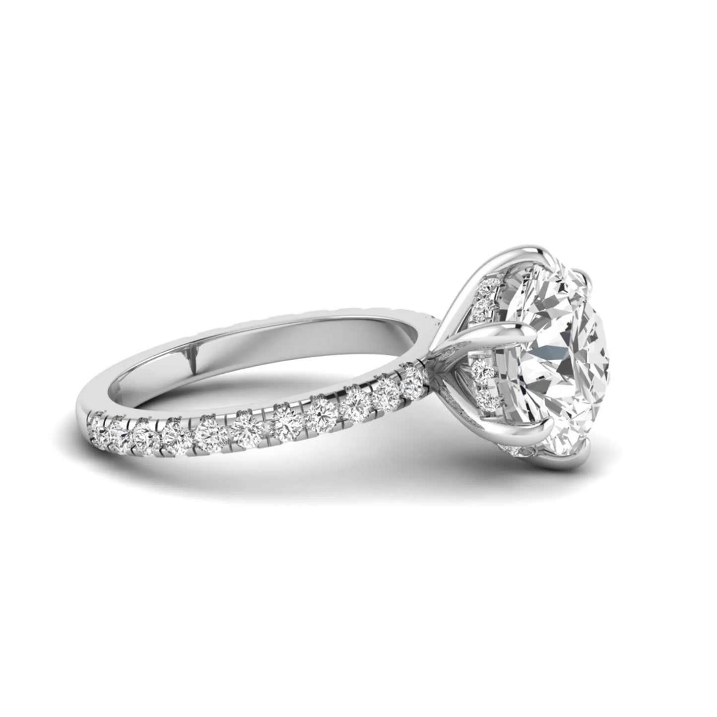 Round cut lab grown diamond solitaire engagement ring with pavé diamond band in white gold design.