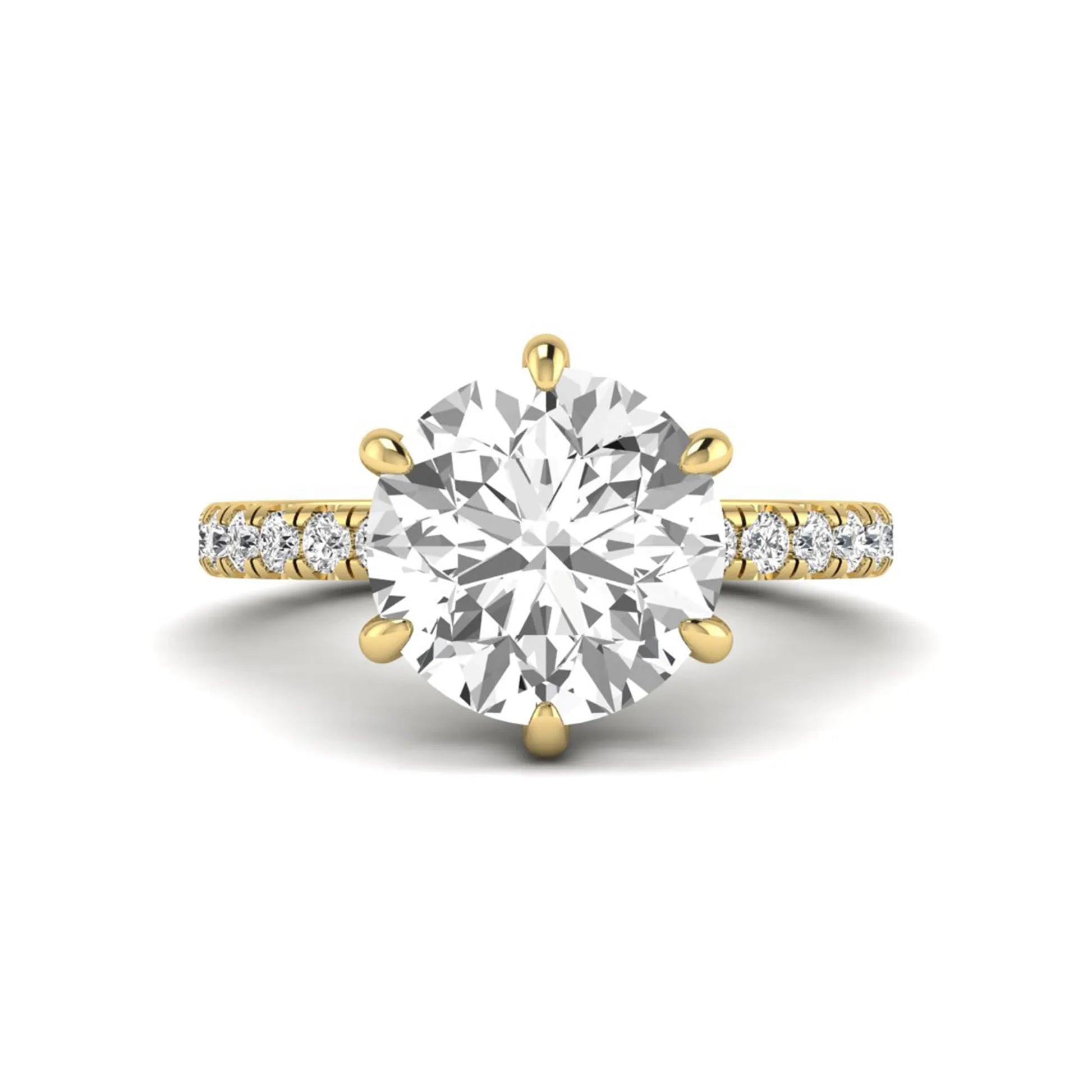 Round cut lab grown diamond solitaire engagement ring with pavé diamond band in yellow gold design.