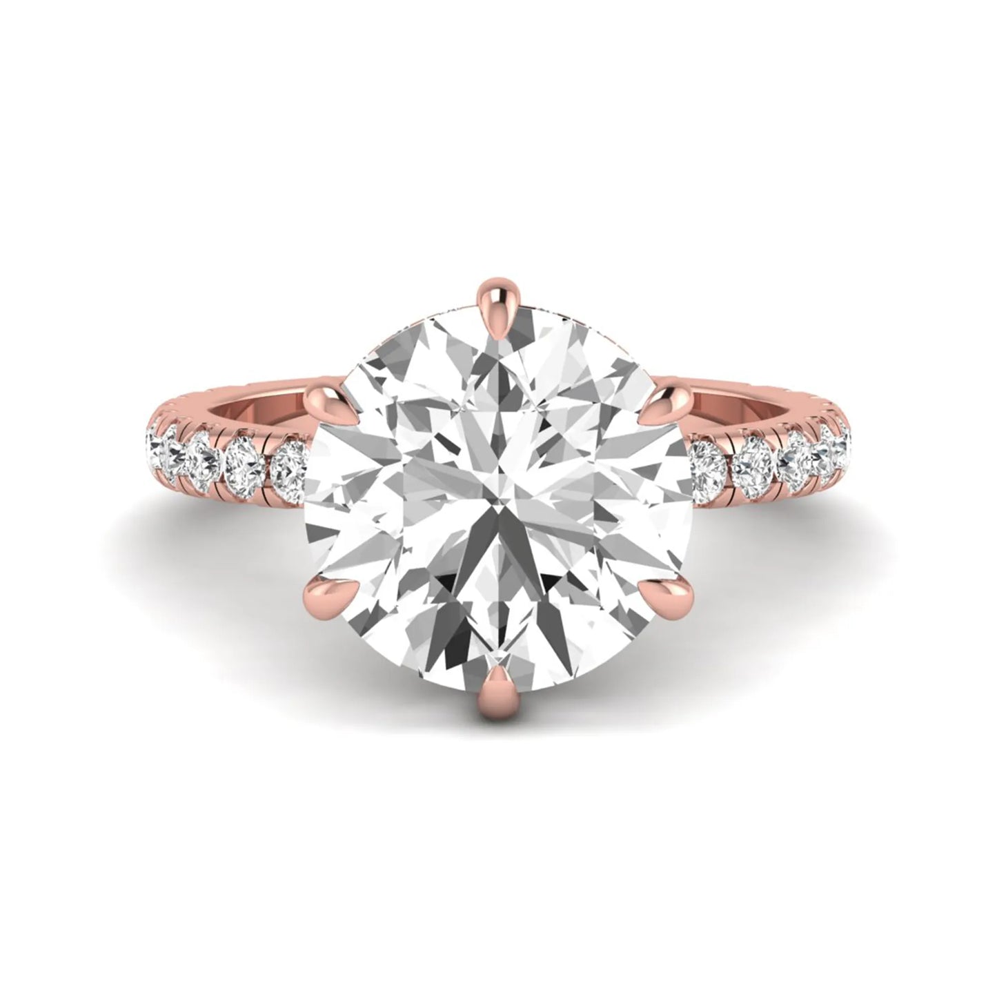 Round cut lab grown diamond solitaire engagement ring with pavé diamond band in rose gold design.