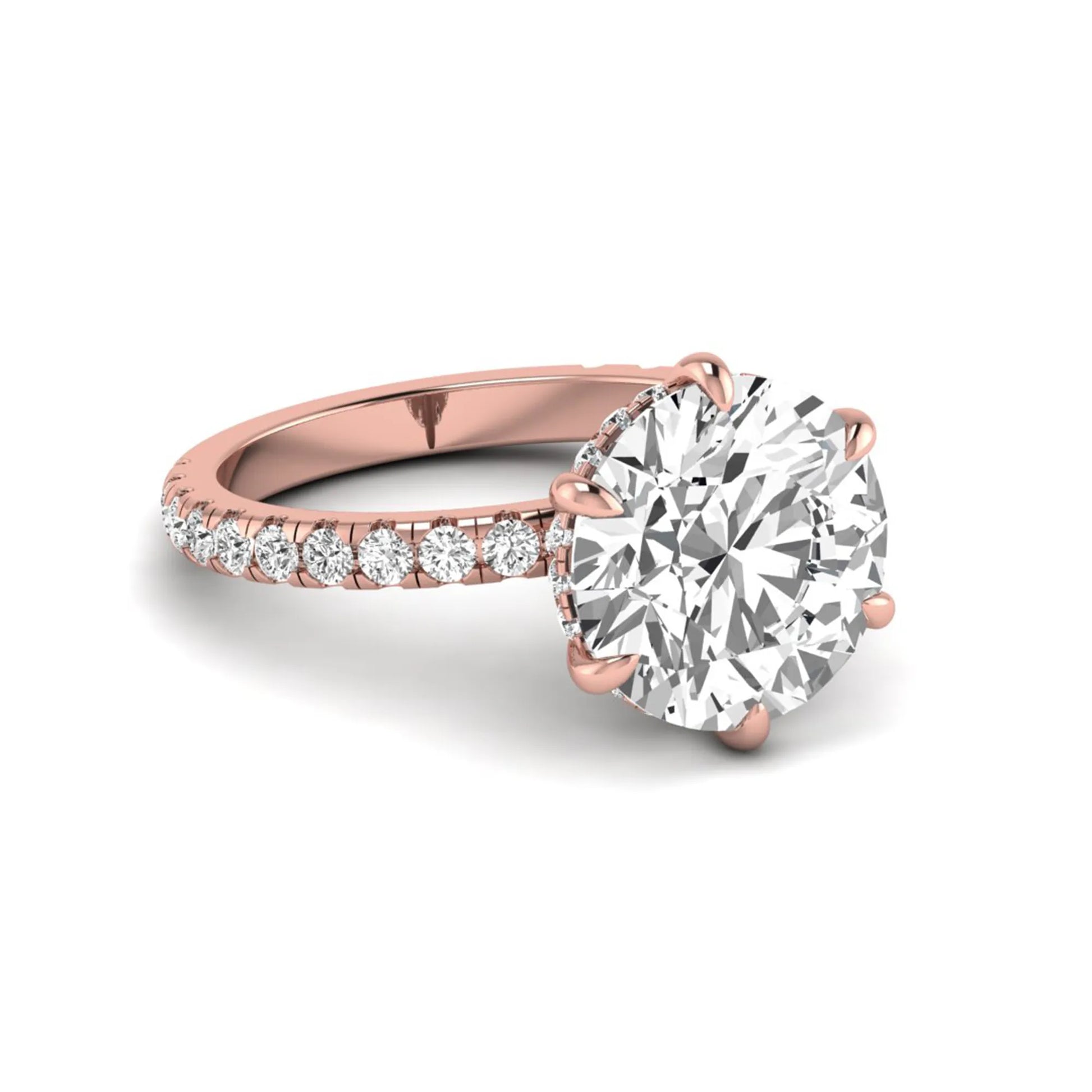 Round cut lab grown diamond solitaire engagement ring with pavé diamond band in rose gold design.