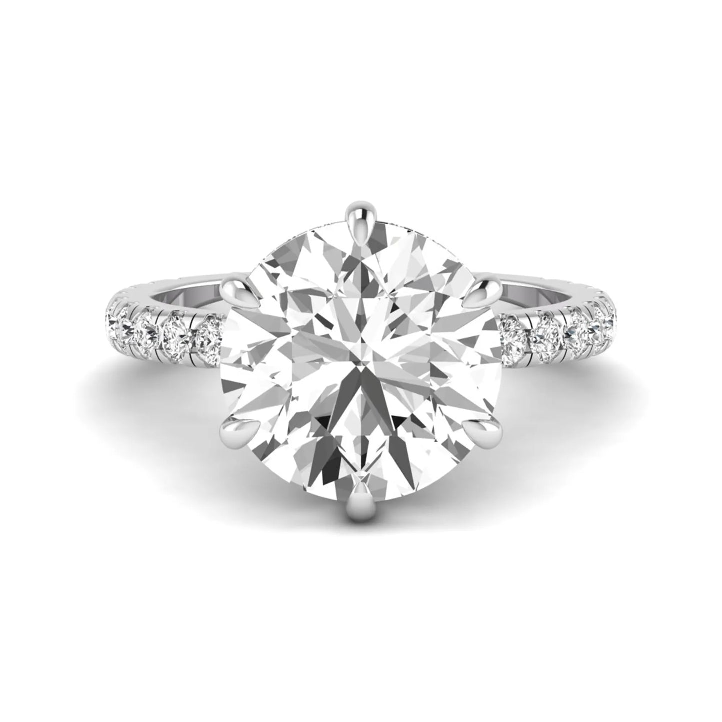 Round cut lab grown diamond solitaire engagement ring with pavé diamond band in white gold design.
