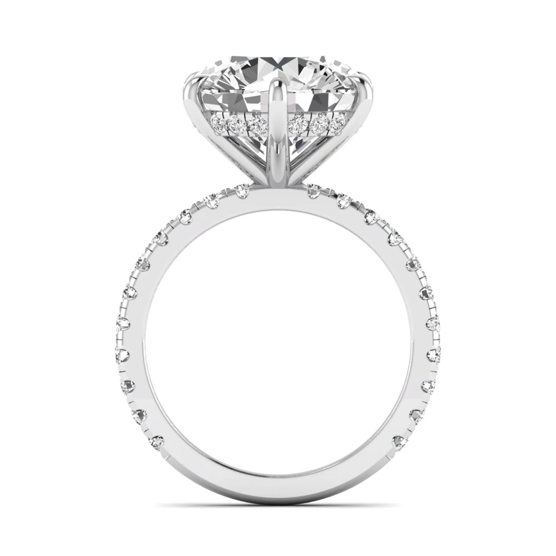 Round cut lab grown diamond solitaire engagement ring with pavé diamond band in white gold design.