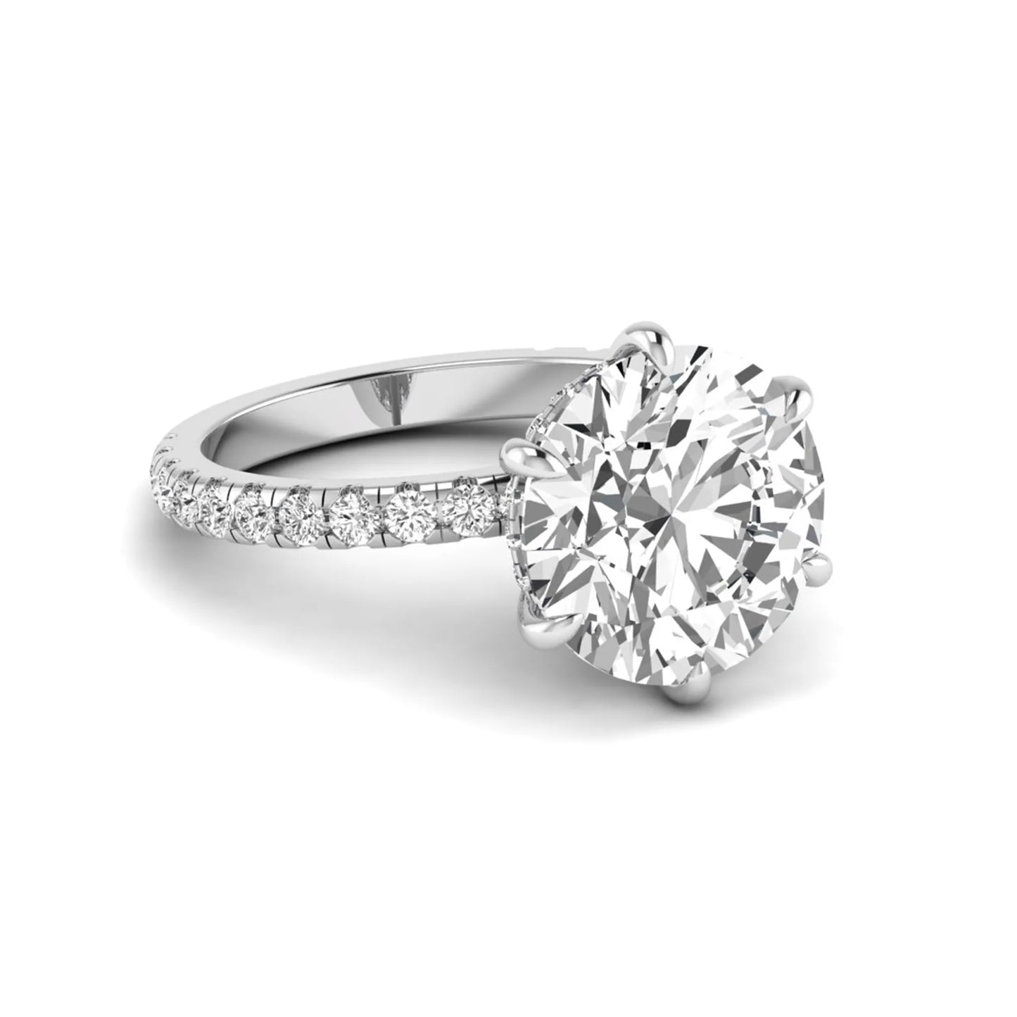 Round cut lab grown diamond solitaire engagement ring with pavé diamond band in white gold design.