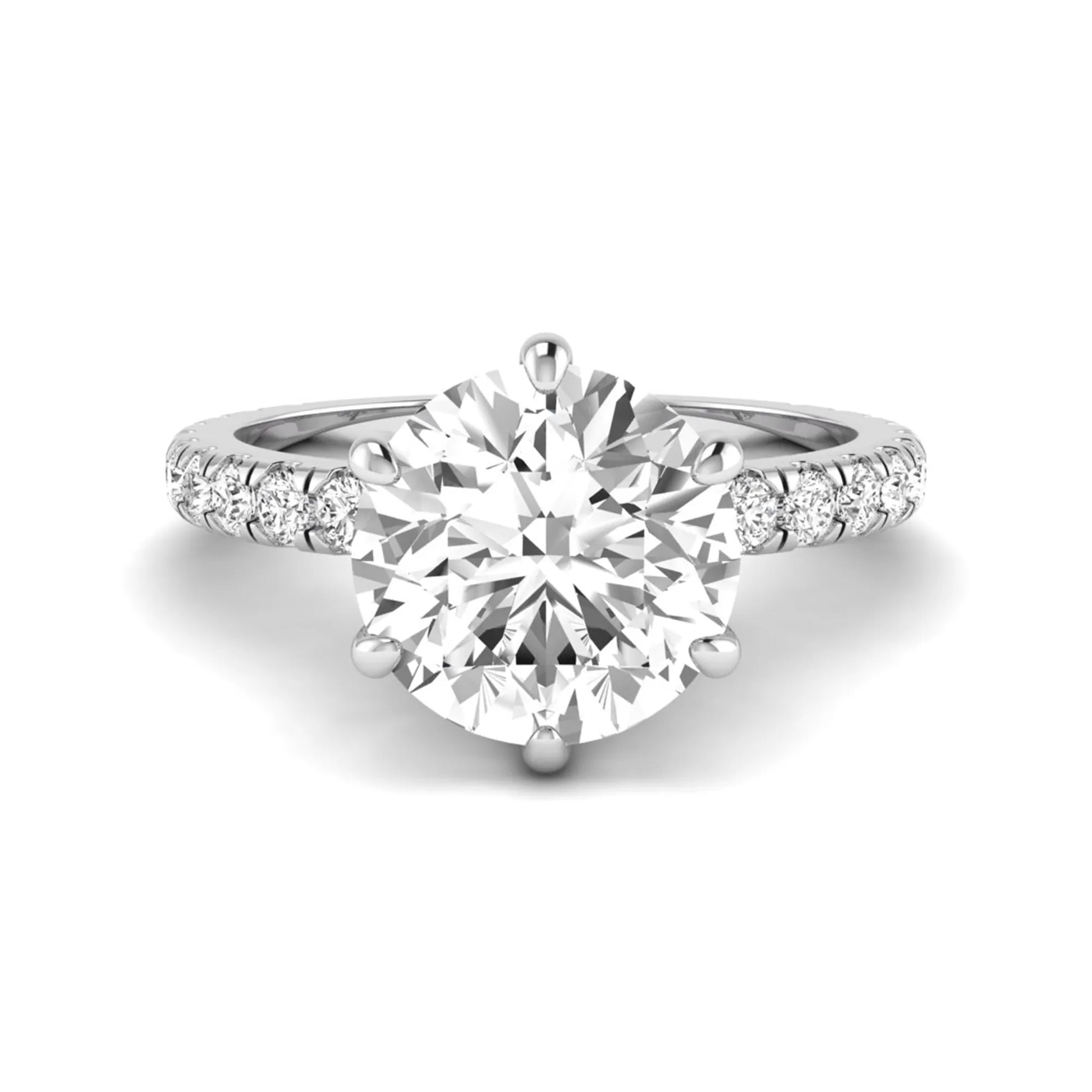 Round cut lab grown diamond solitaire engagement ring with pavé band in white gold design.