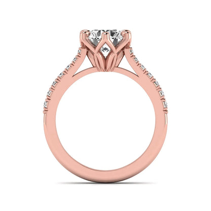 Round solitaire pavé lab grown diamond engagement ring featuring a 2.43 carat round brilliant IGI certified center diamond with pavé accent diamonds on a rose gold band.
