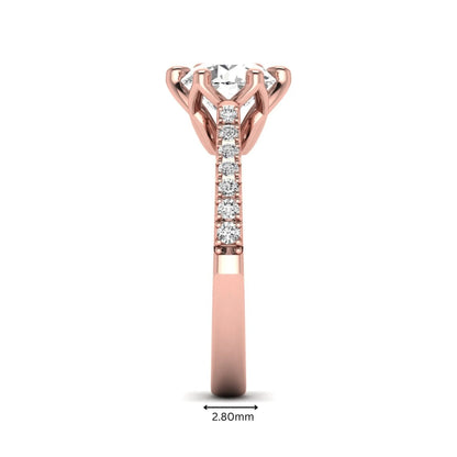 Round solitaire pavé lab grown diamond engagement ring featuring a 2.43 carat round brilliant IGI certified center diamond with pavé accent diamonds on a rose gold band.