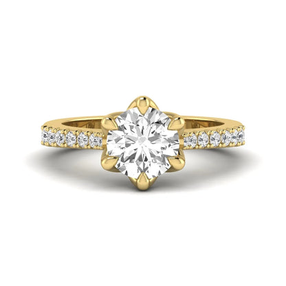 Round solitaire pavé lab grown diamond engagement ring featuring a 2.43 carat round brilliant IGI certified center diamond with pavé accent diamonds on a yellow gold band.