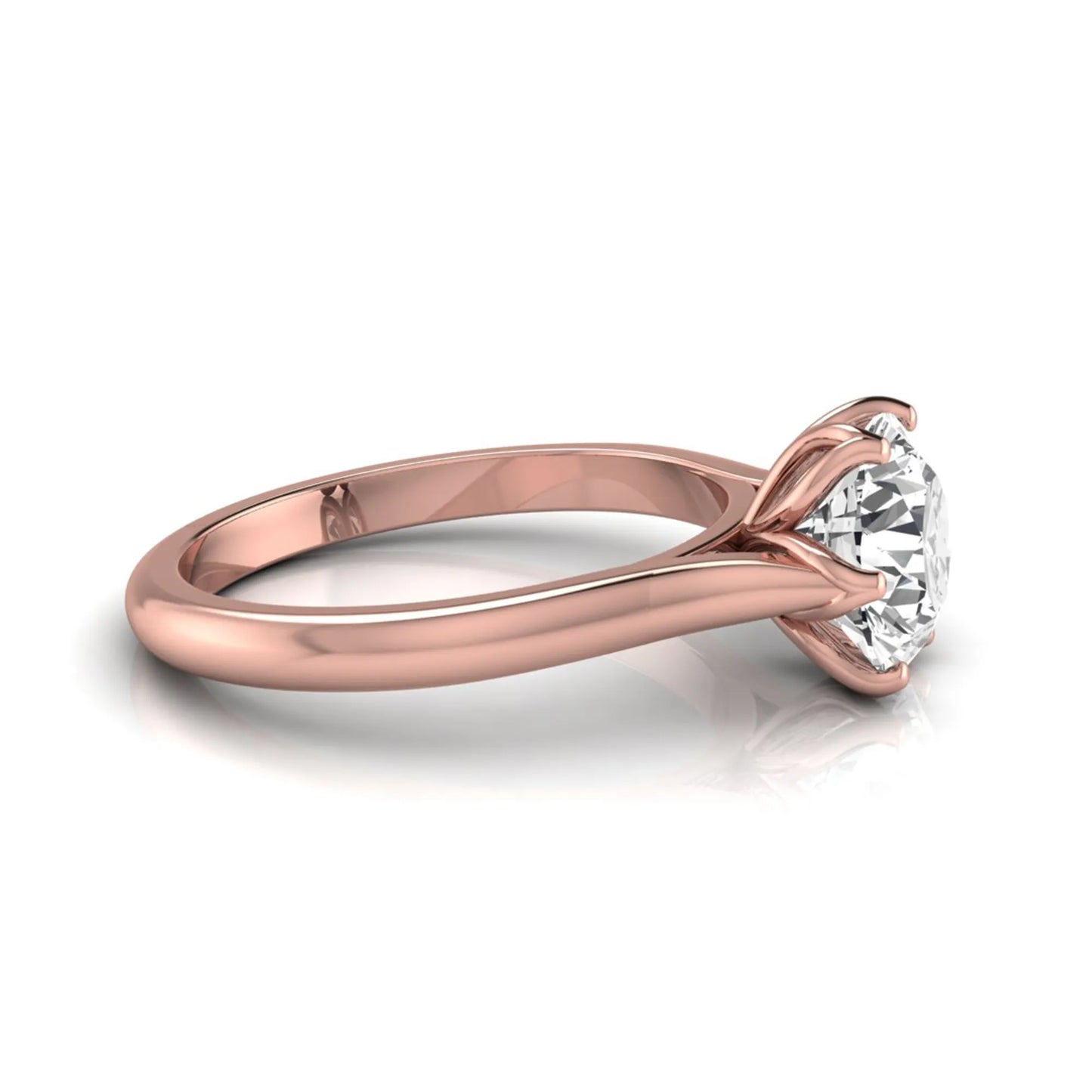 Round cut lab grown diamond solitaire engagement ring featuring a classic six-prong setting on a polished rose gold style band.