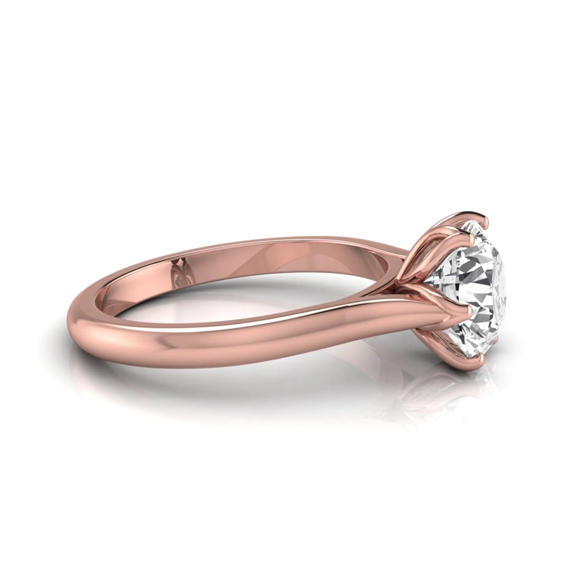 Round cut lab grown diamond solitaire engagement ring featuring a classic six-prong setting on a polished rose gold style band.