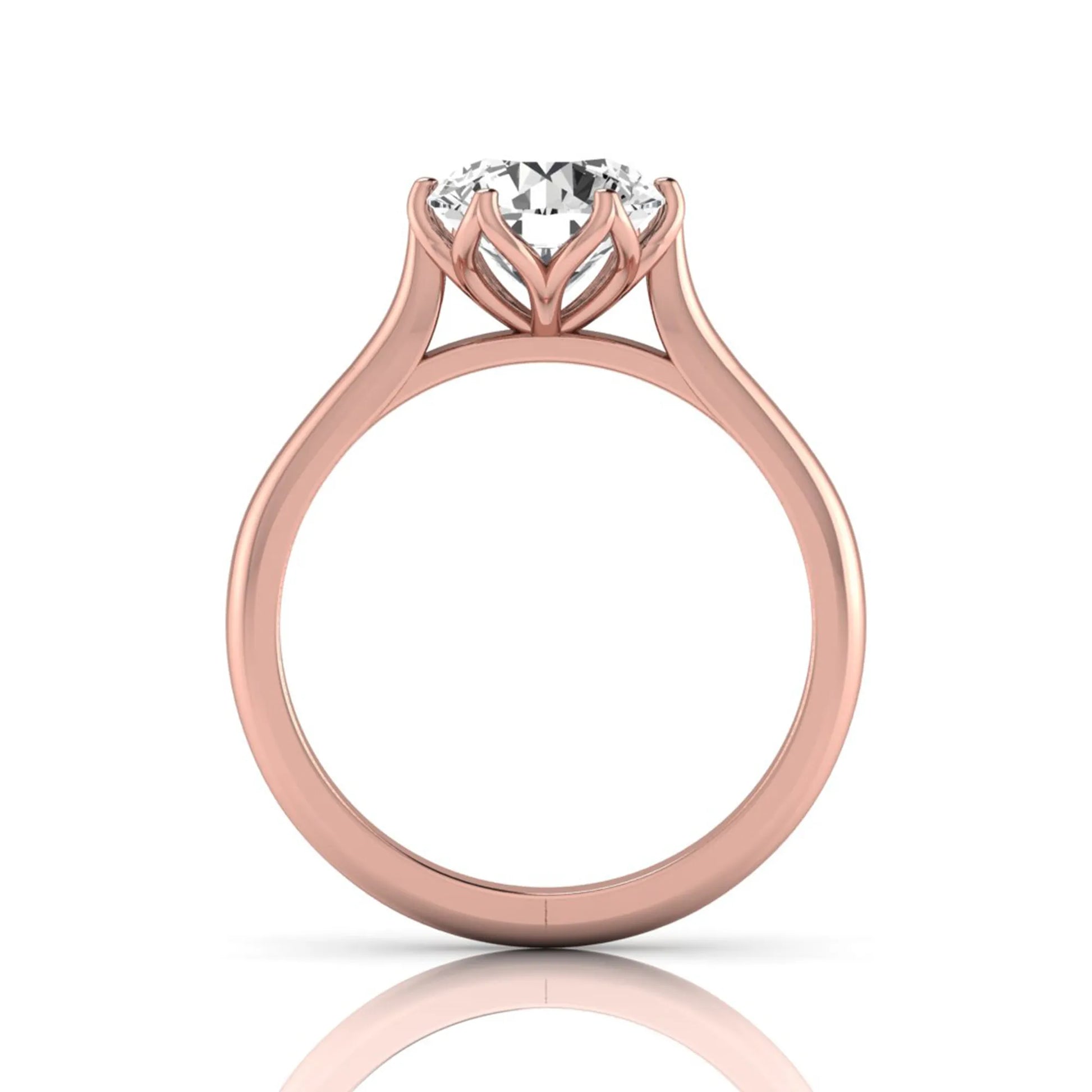 Round cut lab grown diamond solitaire engagement ring featuring a classic six-prong setting on a polished rose gold style band.