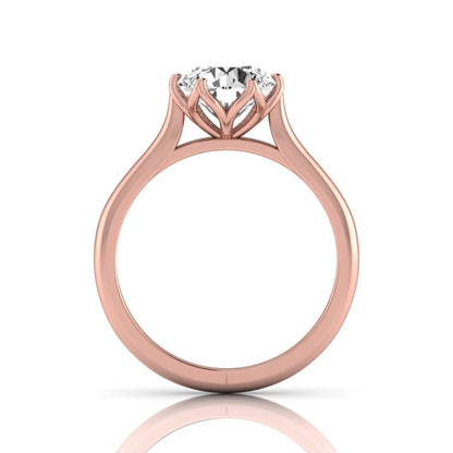Round cut lab grown diamond solitaire engagement ring featuring a classic six-prong setting on a polished rose gold style band.