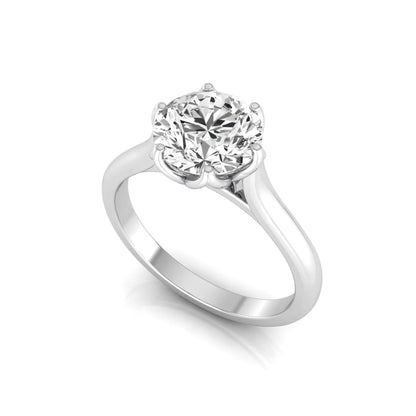Round cut lab grown diamond solitaire engagement ring featuring a classic six-prong setting on a polished white gold style band.