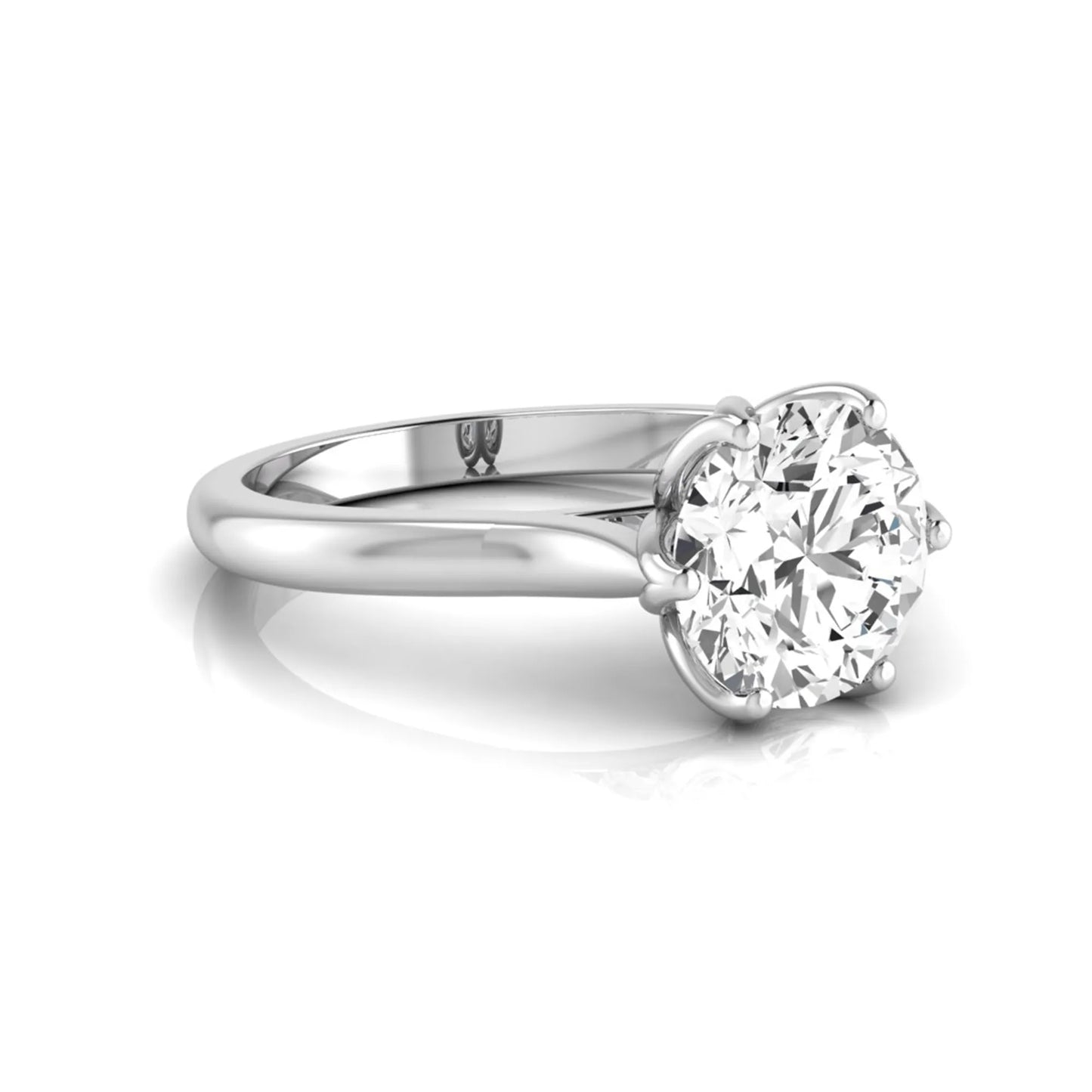 Round cut lab grown diamond solitaire engagement ring featuring a classic six-prong setting on a polished white gold style band.