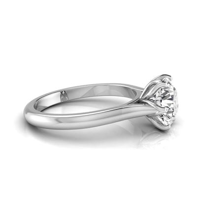 Round cut lab grown diamond solitaire engagement ring featuring a classic six-prong setting on a polished white gold style band.