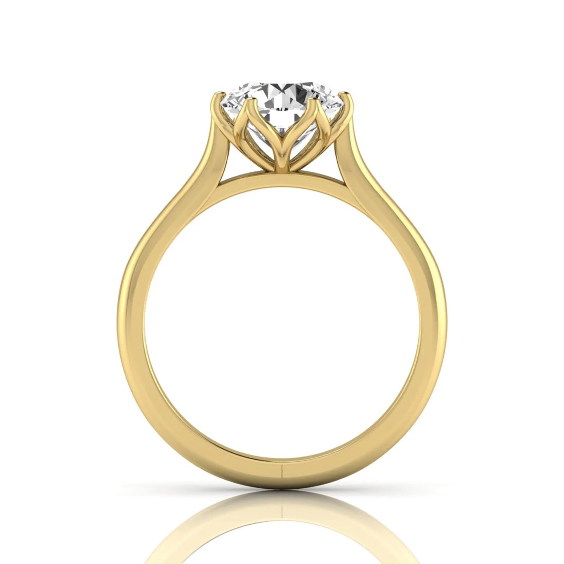 Round cut lab grown diamond solitaire engagement ring featuring a classic six-prong setting on a polished yellow gold style band.