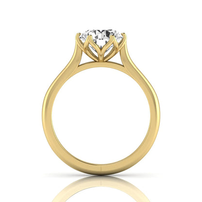 Round cut lab grown diamond solitaire engagement ring featuring a classic six-prong setting on a polished yellow gold style band.