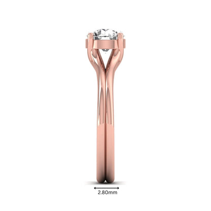IGI certified 1.04 carat round cut lab grown diamond solitaire engagement ring with elegant split shank in rose gold.