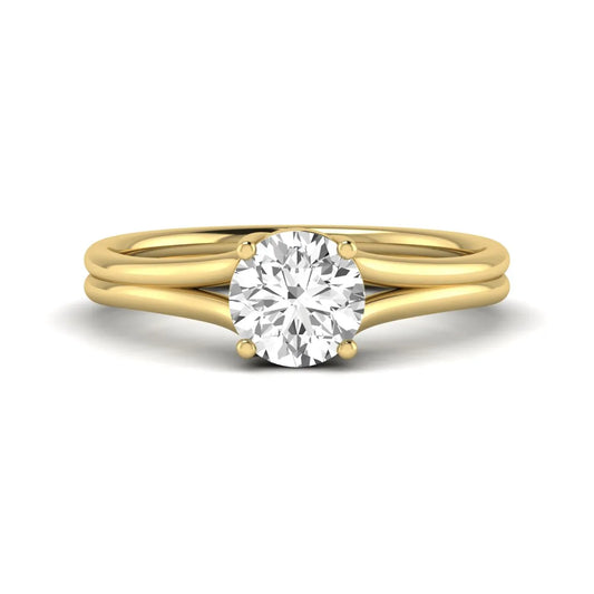 IGI certified 1.04 carat round cut lab grown diamond solitaire engagement ring with elegant split shank in yellow gold.