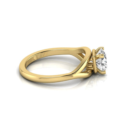 Round cut lab grown diamond solitaire engagement ring with split shank design in yellow gold style.
