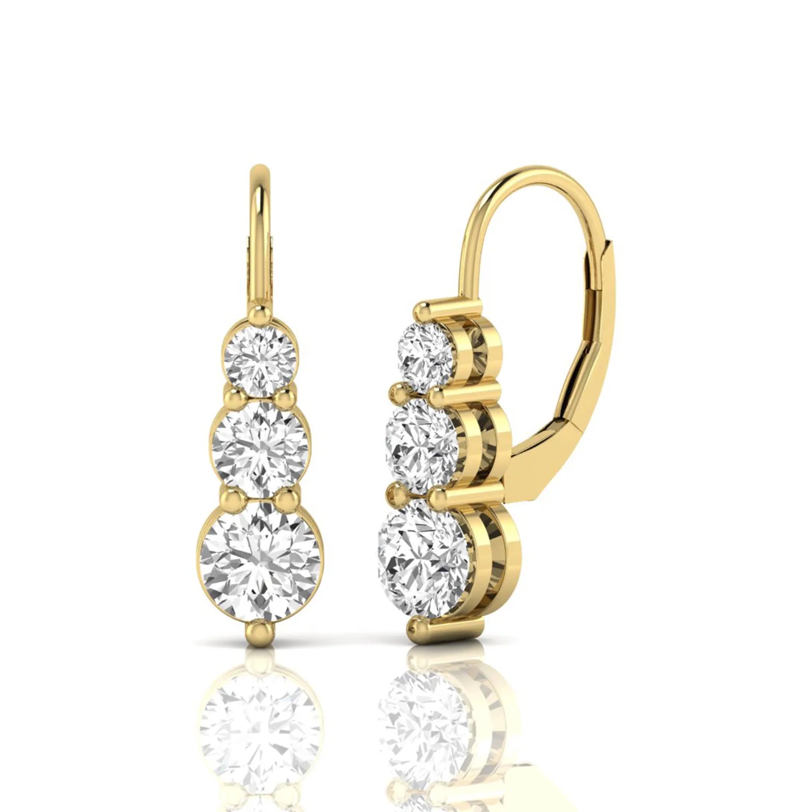 Round cut lab grown diamond graduated three stone drop earrings featuring a shared four-prong setting with secure lever back closure and yellow gold tone design.