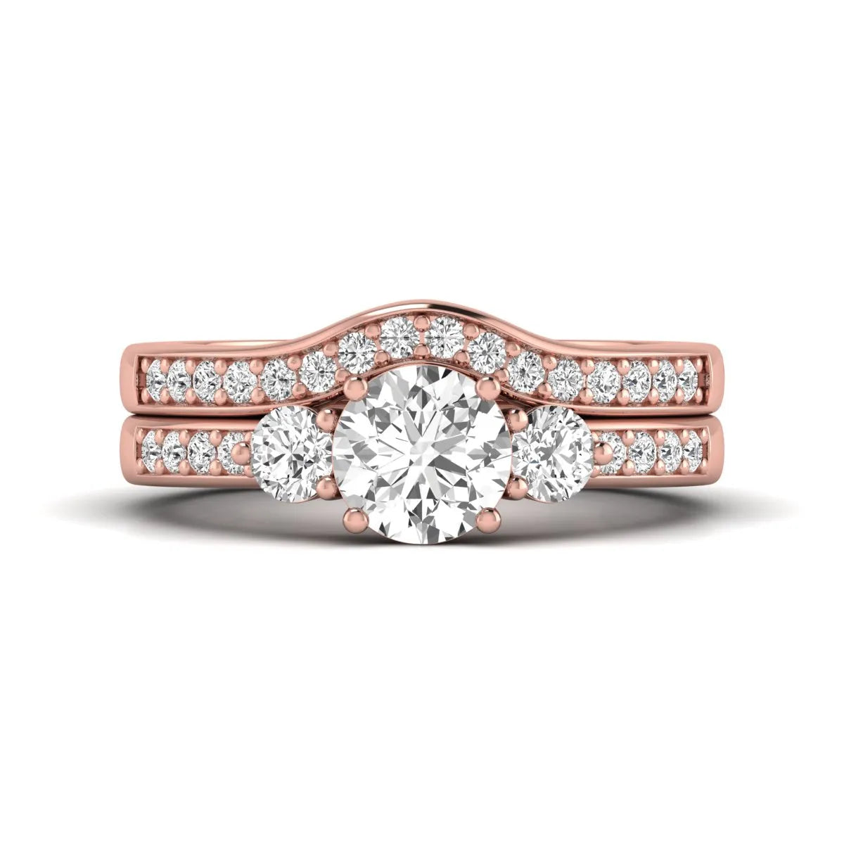 Round cut three stone lab grown diamond bridal ring set with matching diamond wedding band in rose gold featuring a 1.03 carat IGI certified center diamond.
