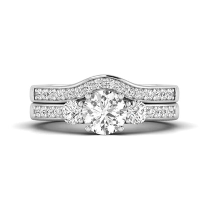 Round cut three stone lab grown diamond bridal ring set with matching diamond wedding band in white gold featuring a 1.03 carat IGI certified center diamond.