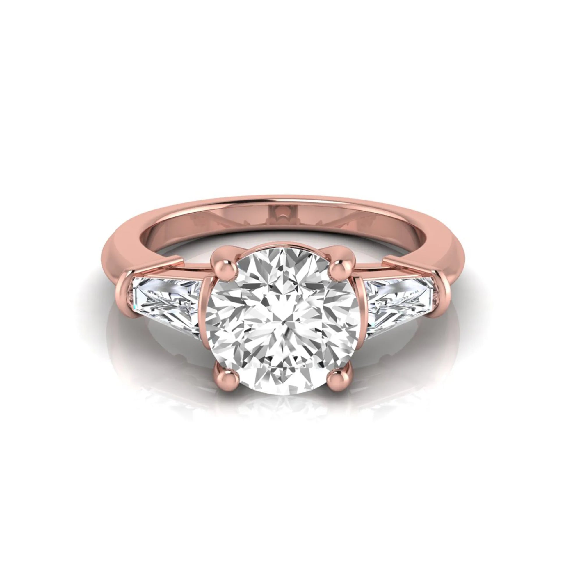 Round cut lab grown diamond three-stone engagement ring featuring tapered baguette side diamonds in a classic four-prong rose gold setting.