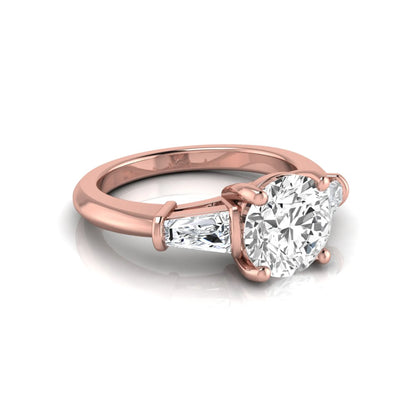 Round cut lab grown diamond three-stone engagement ring featuring tapered baguette side diamonds in a classic four-prong rose gold setting.