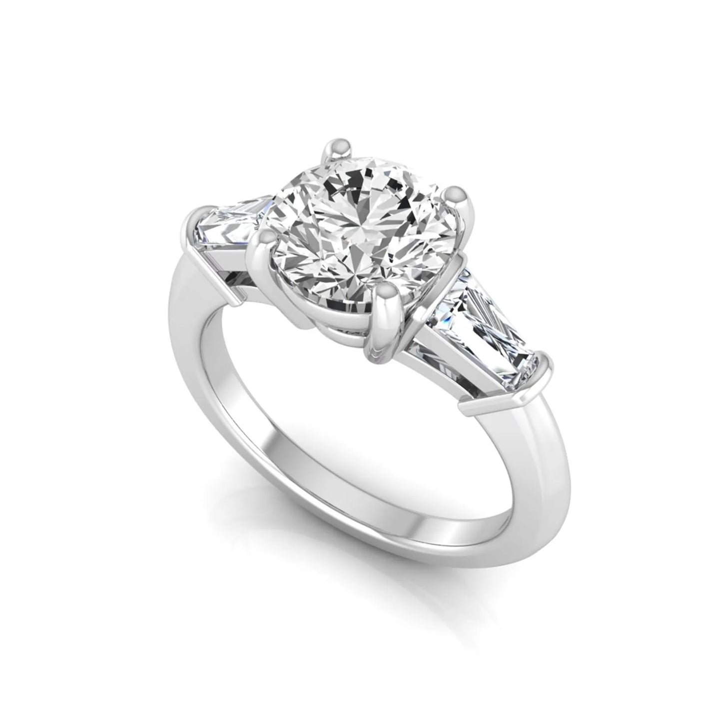 Round cut lab grown diamond three-stone engagement ring featuring tapered baguette side diamonds in a classic four-prong white gold setting.
