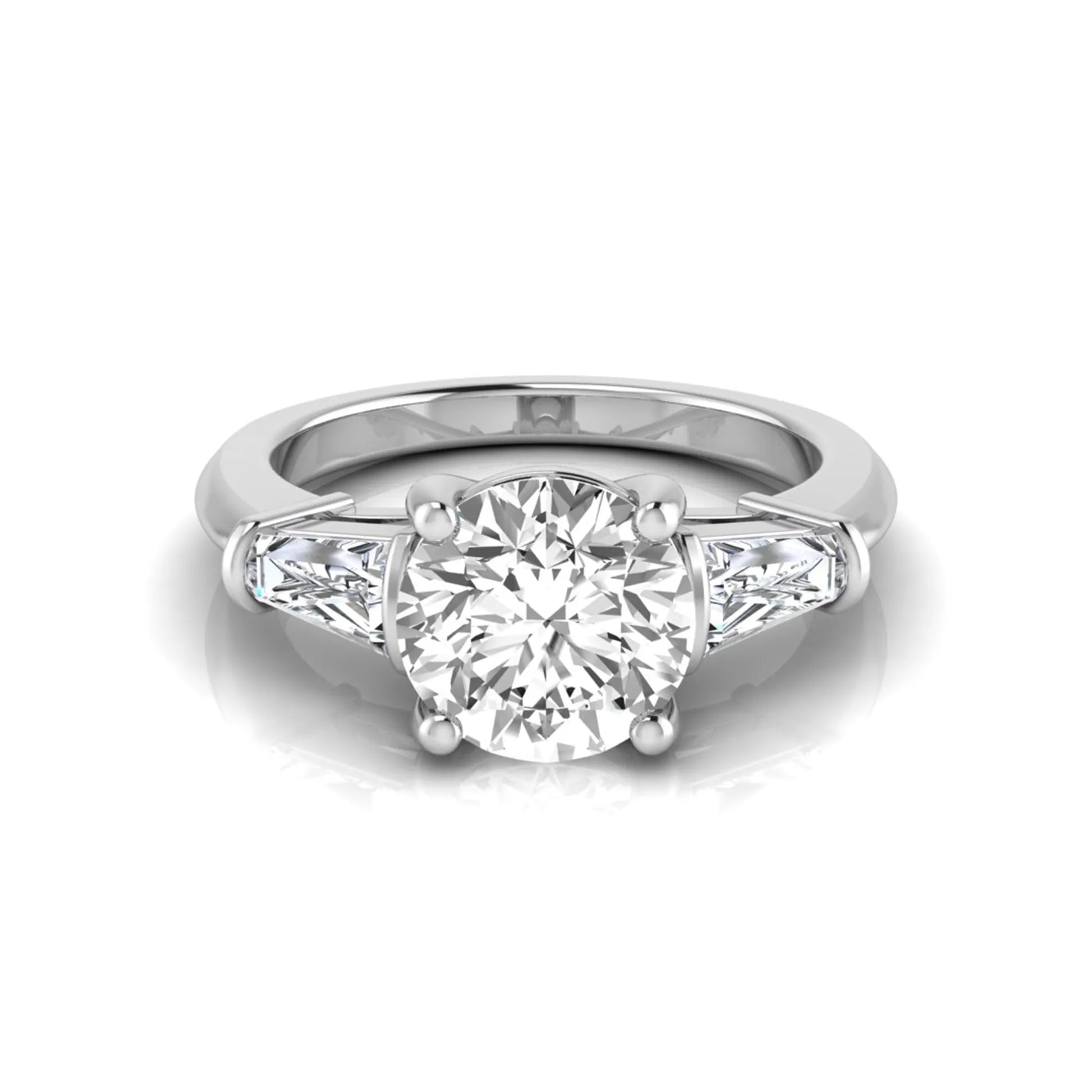 Round cut lab grown diamond three-stone engagement ring featuring tapered baguette side diamonds in a classic four-prong white gold setting.