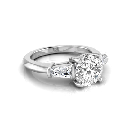 Round cut lab grown diamond three-stone engagement ring featuring tapered baguette side diamonds in a classic four-prong white gold setting.