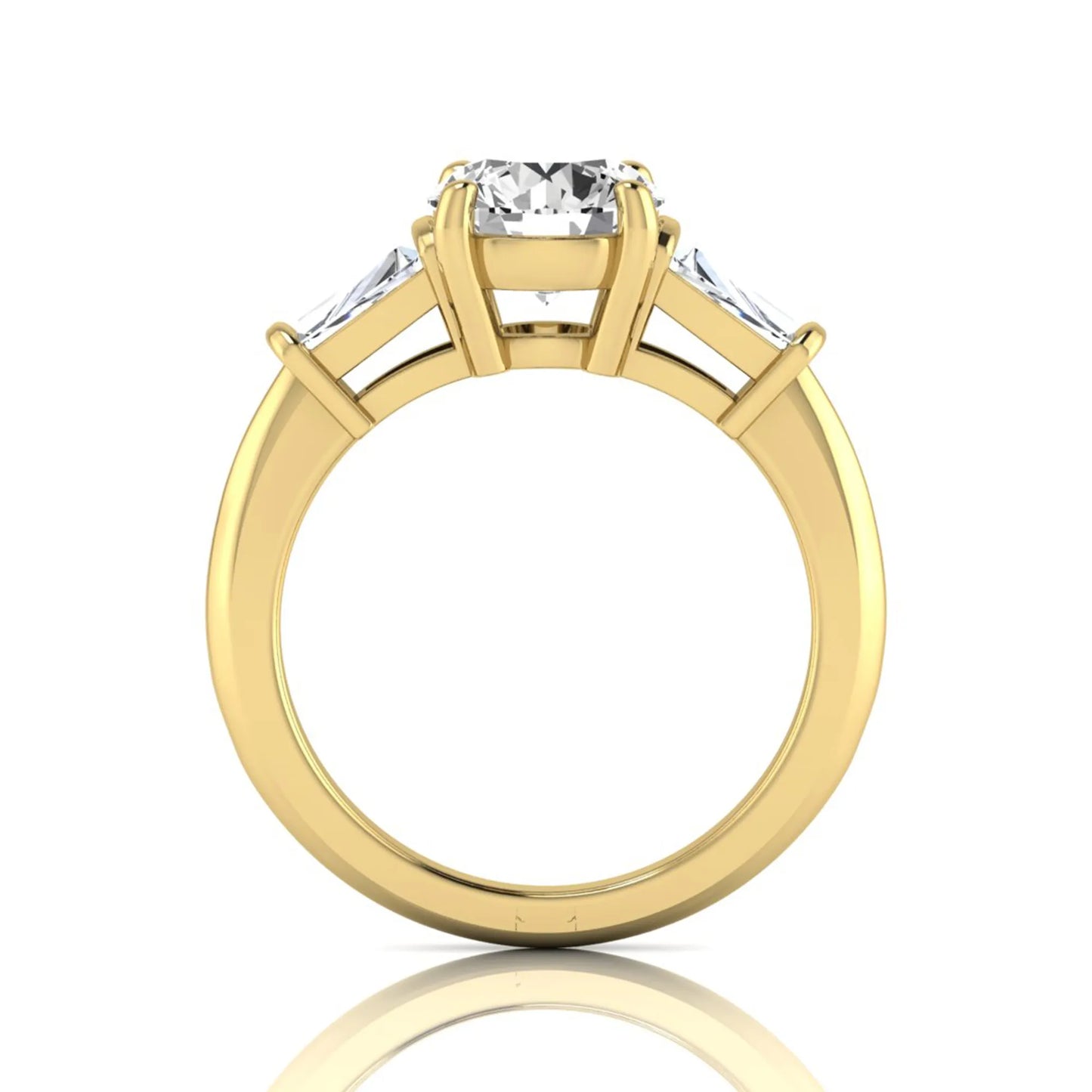 Round cut lab grown diamond three-stone engagement ring featuring tapered baguette side diamonds in a classic four-prong yellow gold setting.