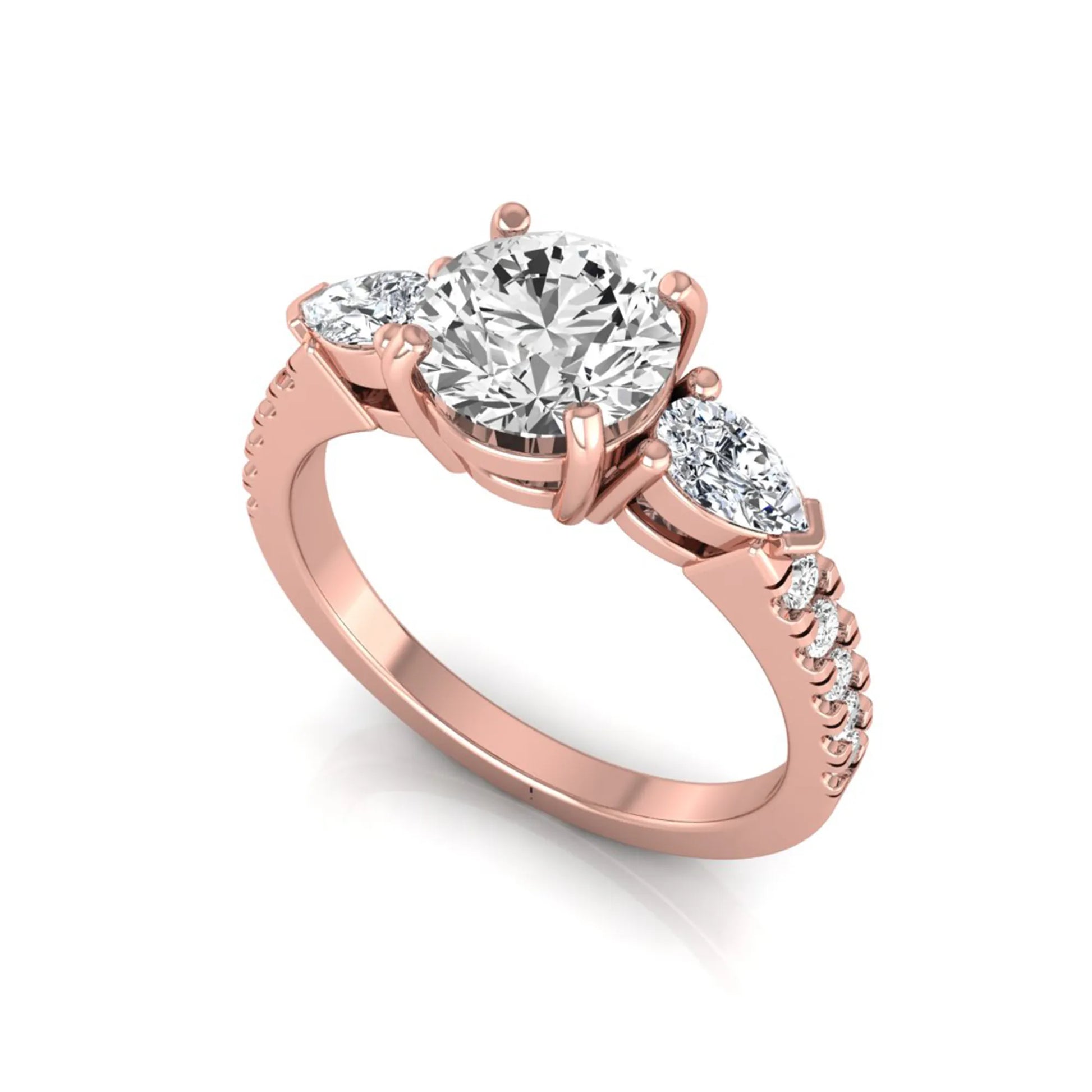 Round cut lab grown diamond three stone engagement ring featuring a 1.28 carat IGI certified center diamond with pear and round side diamonds on a pavé rose gold band.