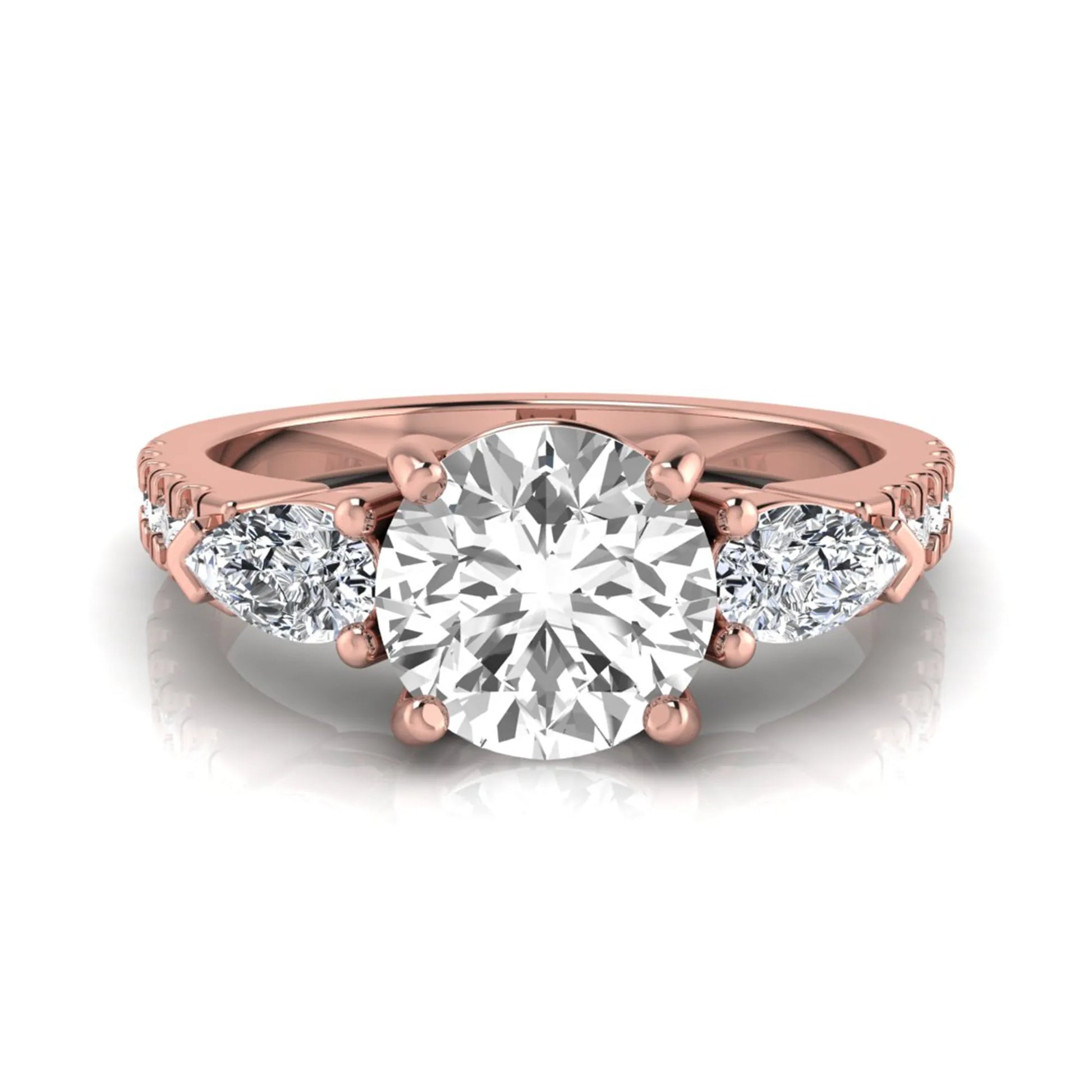 Round cut lab grown diamond three stone engagement ring featuring a 1.28 carat IGI certified center diamond with pear and round side diamonds on a pavé rose gold band.