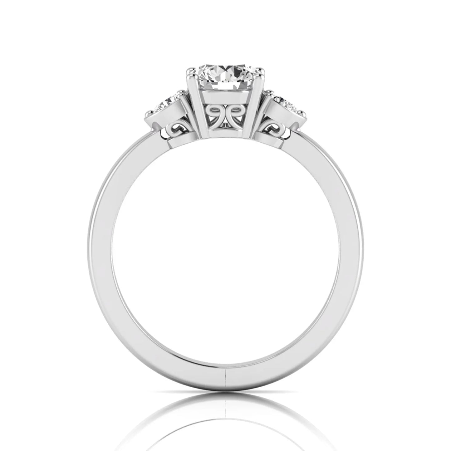 Round cut lab grown diamond three stone engagement ring featuring a brilliant center diamond with round side diamonds in a four-prong white gold tone setting.