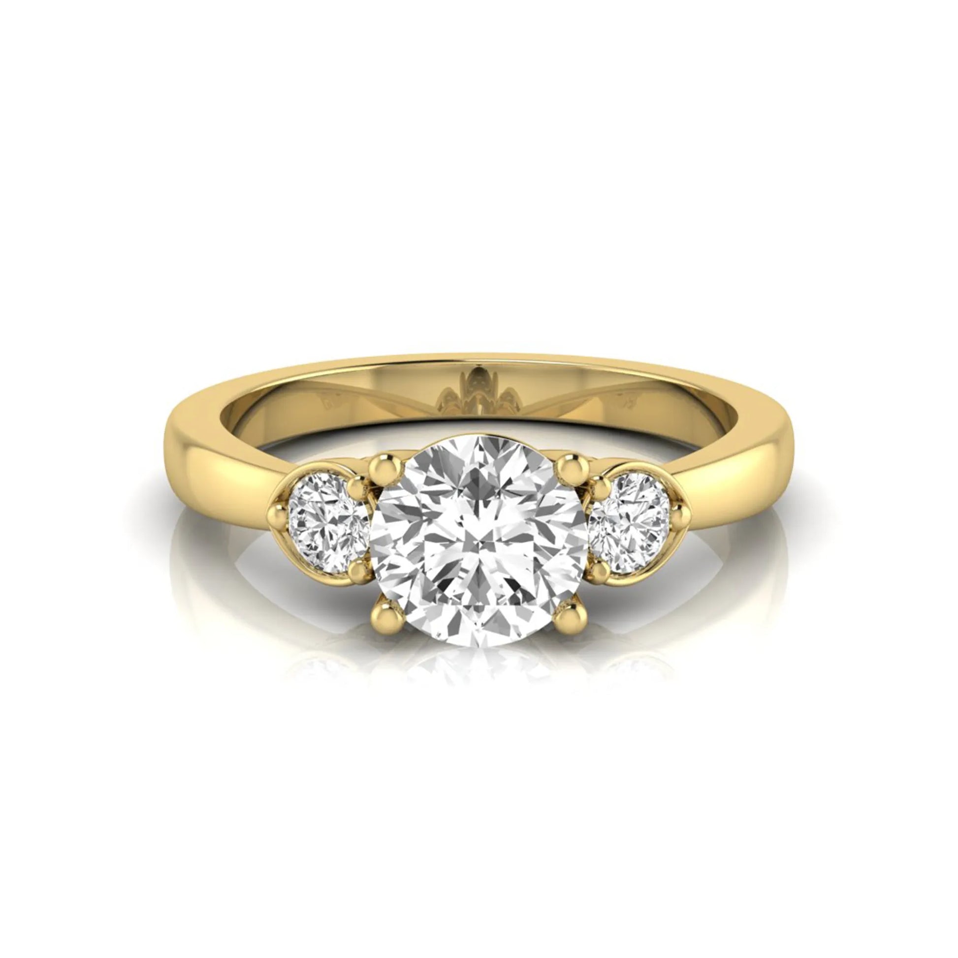 Round cut lab grown diamond three stone engagement ring featuring a brilliant center diamond with round side diamonds in a four-prong yellow gold tone setting.