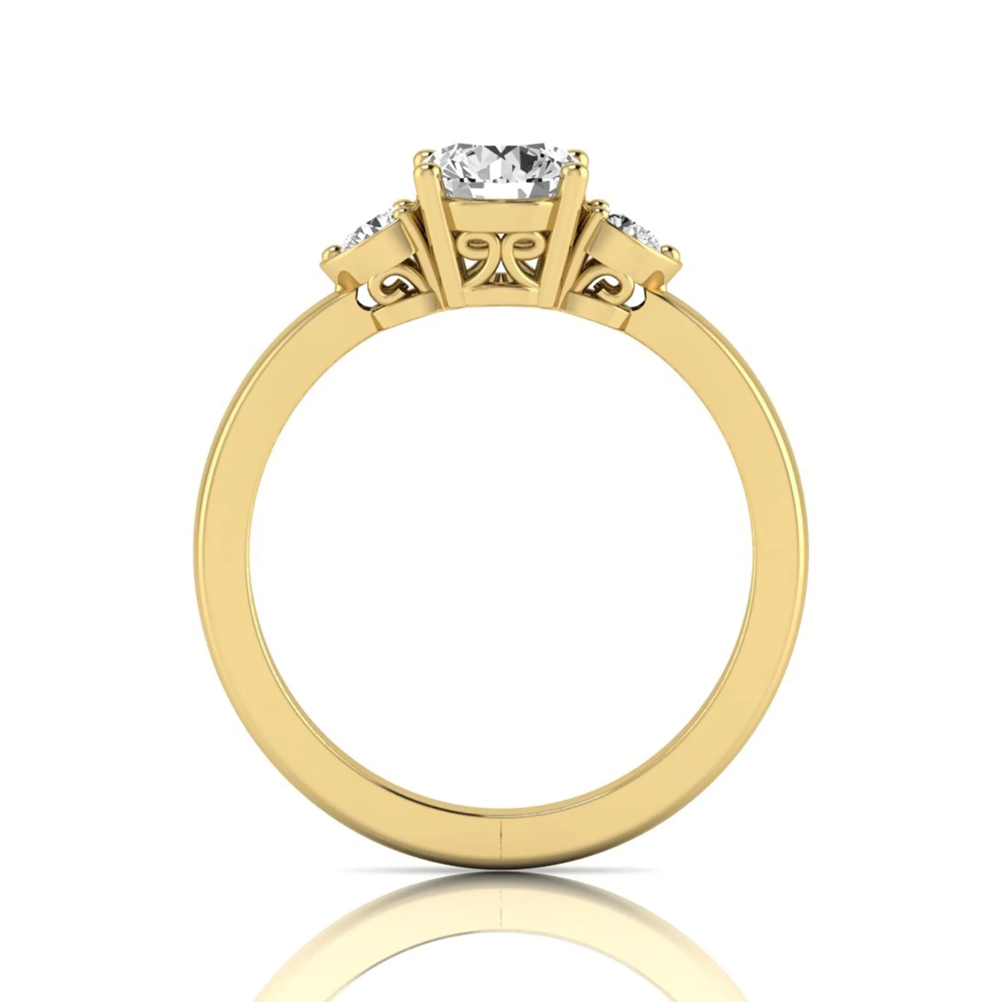 Round cut lab grown diamond three stone engagement ring featuring a brilliant center diamond with round side diamonds in a four-prong yellow gold tone setting.