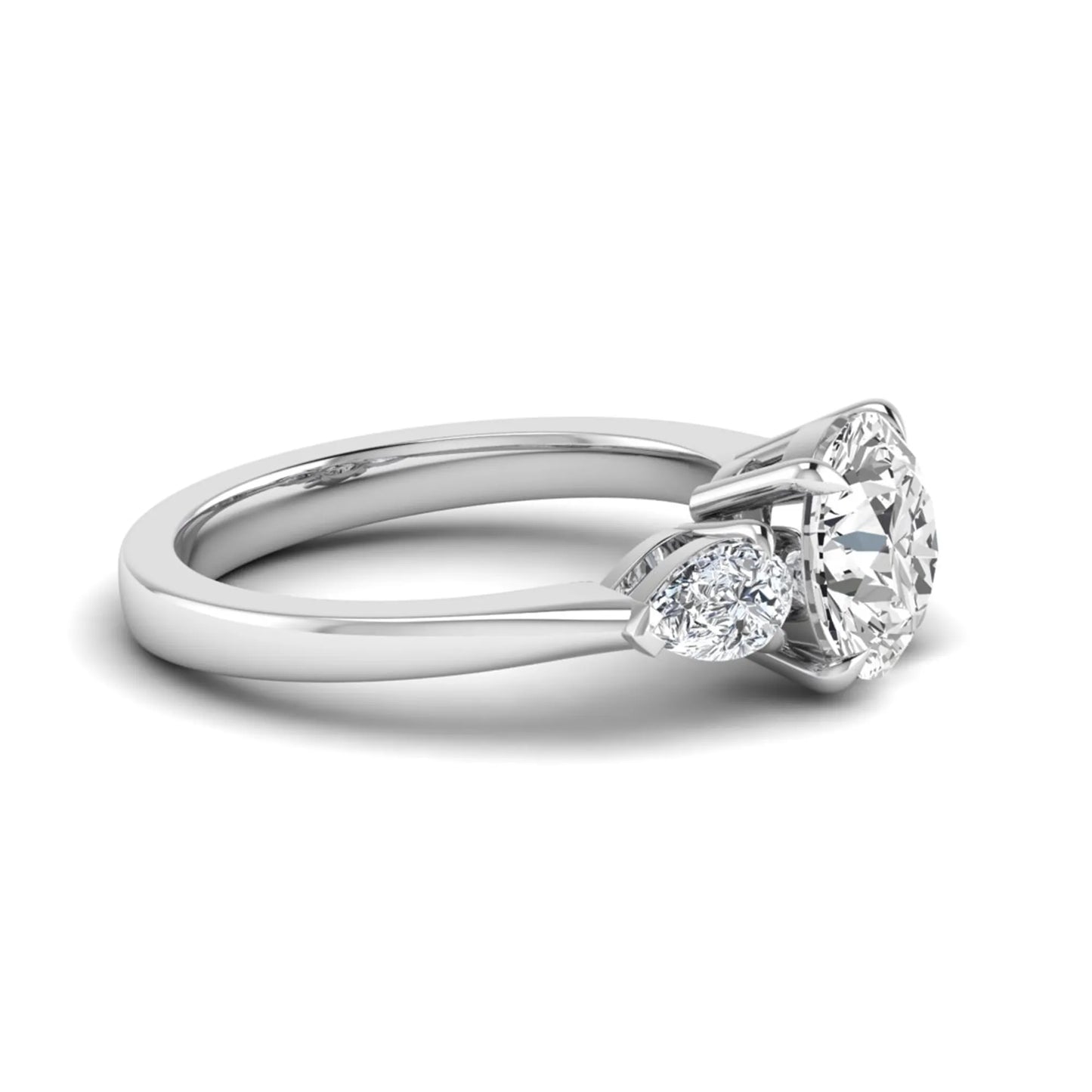 Round three stone prong set lab grown diamond engagement ring featuring a 2.00 carat round center diamond with pear cut side diamonds in white gold finish.
