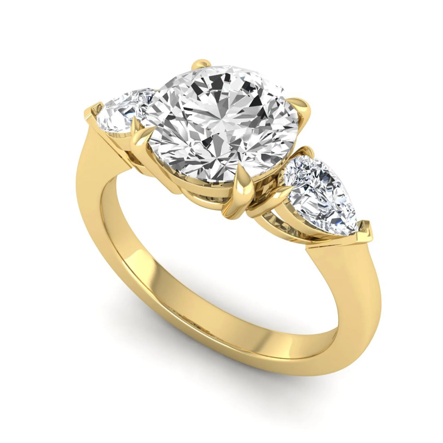 Round three stone prong set lab grown diamond engagement ring featuring a 2.00 carat round center diamond with pear cut side diamonds in yellow gold finish.
