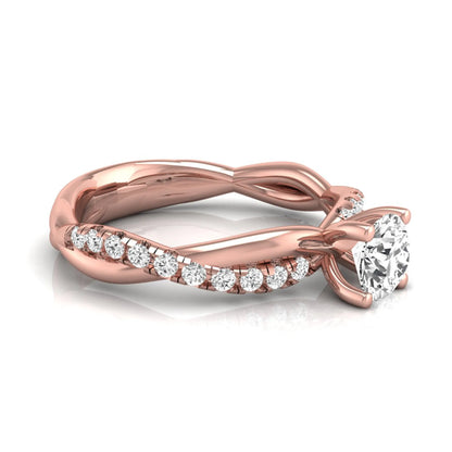 Round twist pavé lab grown diamond solitaire engagement ring featuring a 0.60 carat round cut center diamond with pavé diamond crossover band in a rose gold design.