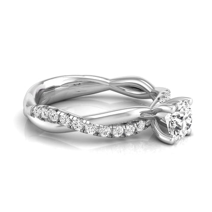 Round twist pavé lab grown diamond solitaire engagement ring featuring a 0.60 carat round cut center diamond with pavé diamond crossover band in a white gold design.