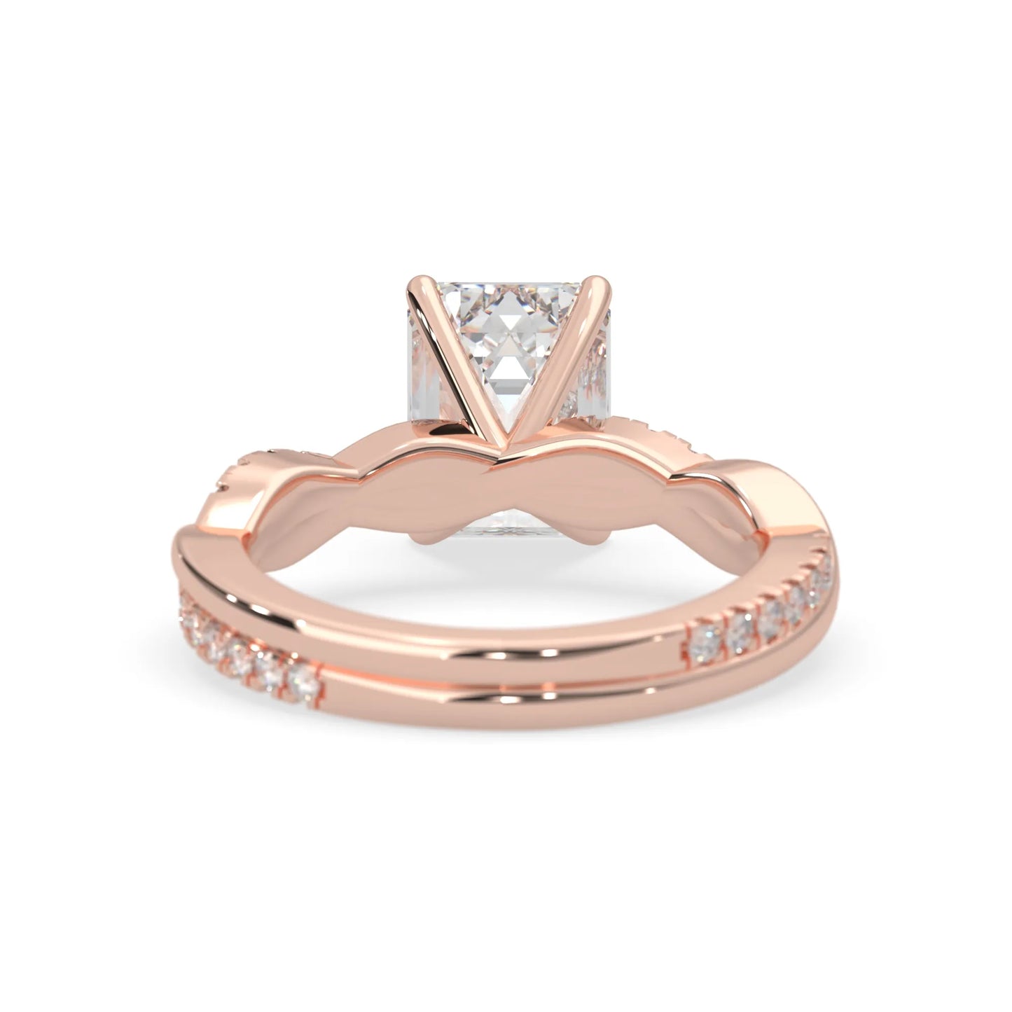 Emerald brilliant lab grown diamond engagement ring with prong setting and twisted pavé diamond band in rose gold tone