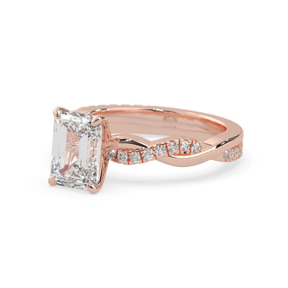 Emerald brilliant lab grown diamond engagement ring with prong setting and twisted pavé diamond band in rose gold tone