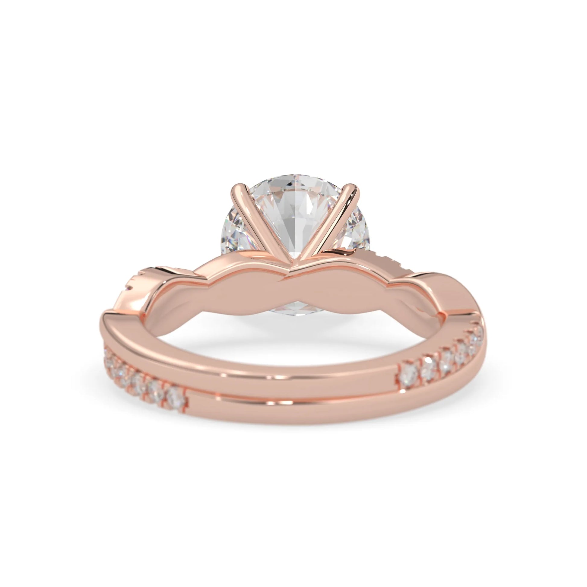 Round brilliant lab grown diamond engagement ring with prong setting and twisted pavé diamond band in rose gold tone