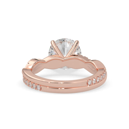 Round brilliant lab grown diamond engagement ring with prong setting and twisted pavé diamond band in rose gold tone