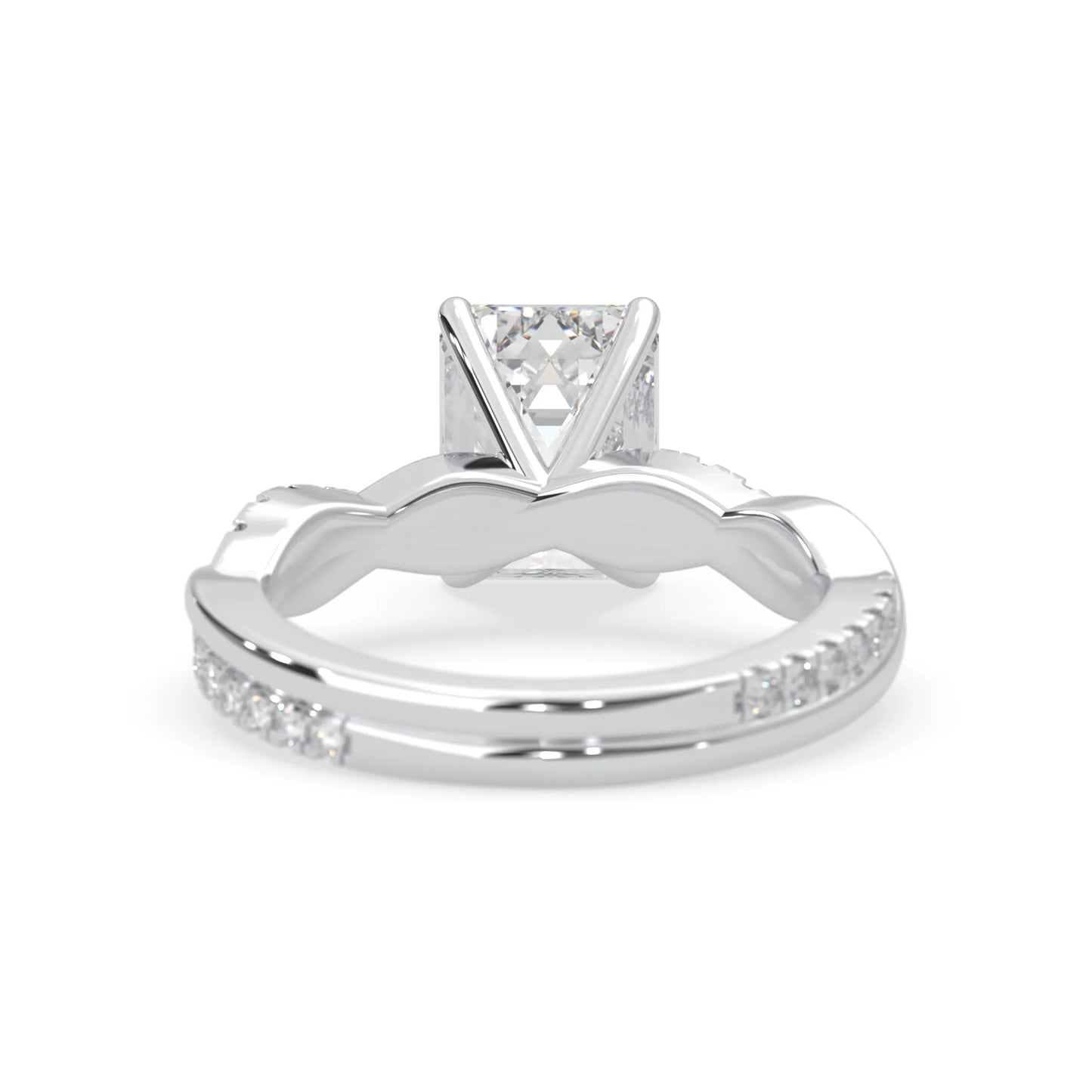 Emerald brilliant lab grown diamond engagement ring with prong setting and twisted pavé diamond band in white gold tone
