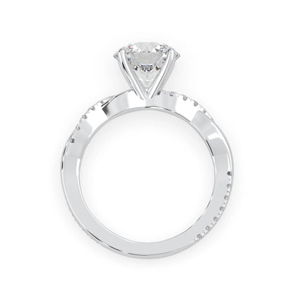 Round brilliant lab grown diamond engagement ring with prong setting and twisted pavé diamond band in white gold tone